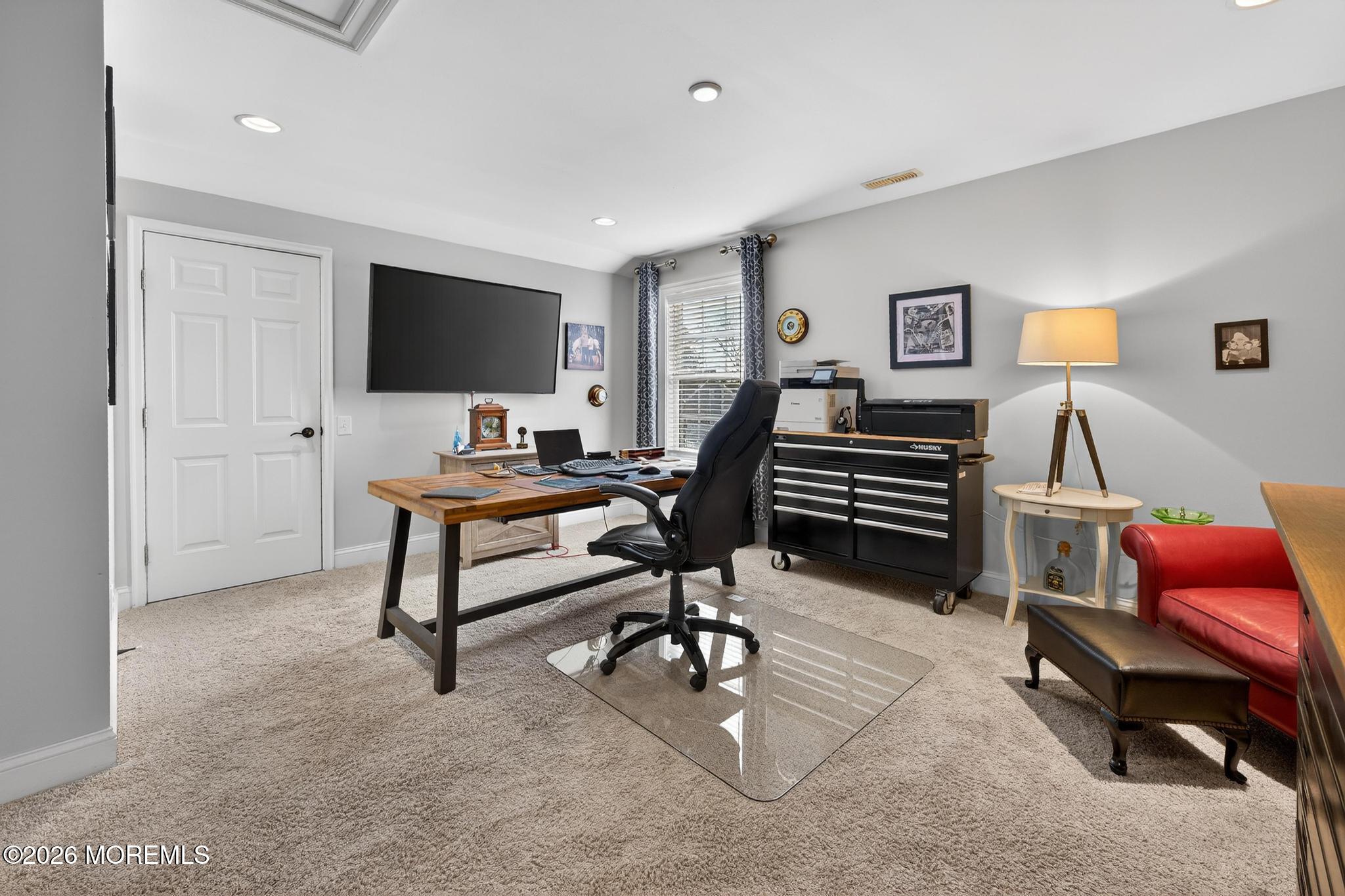 35 Addlestone Lane Manchester Township, NJ 08759 - Photo 35 of 44 a view of a livingroom with workspace and a window
