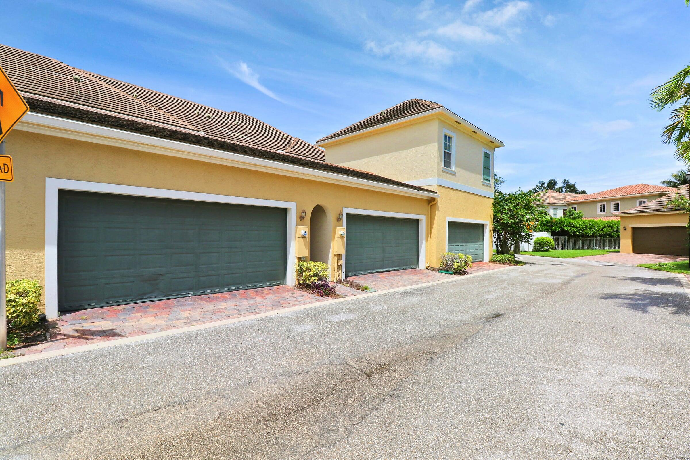 151 Mulligan Place Jupiter, FL 33458 - Photo 22 of 23 Two Car Garage