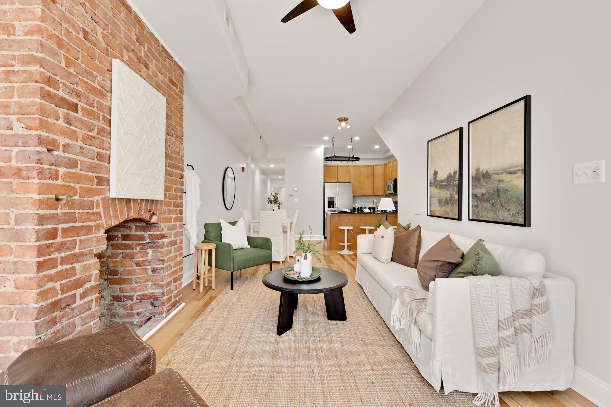 2713 Ontario Road Northwest, Unit 2 Washington, DC 20009 - Photo 1 of 33 a living room with furniture and a large window