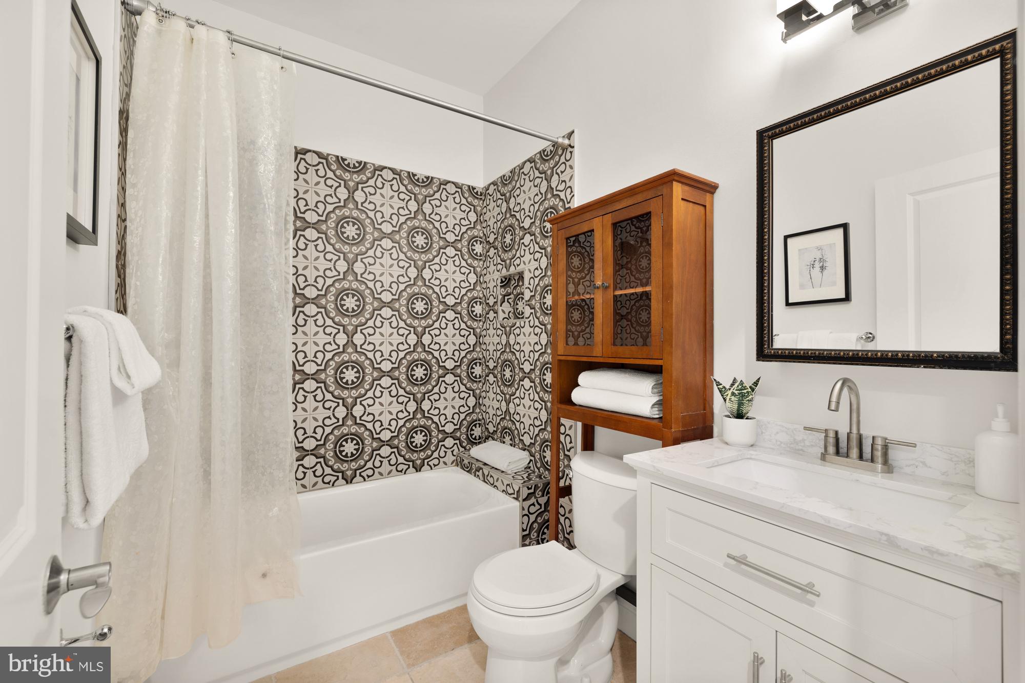 2713 Ontario Road Northwest, Unit 2 Washington, DC 20009 - Photo 22 of 33 a bathroom with a sink toilet and shower