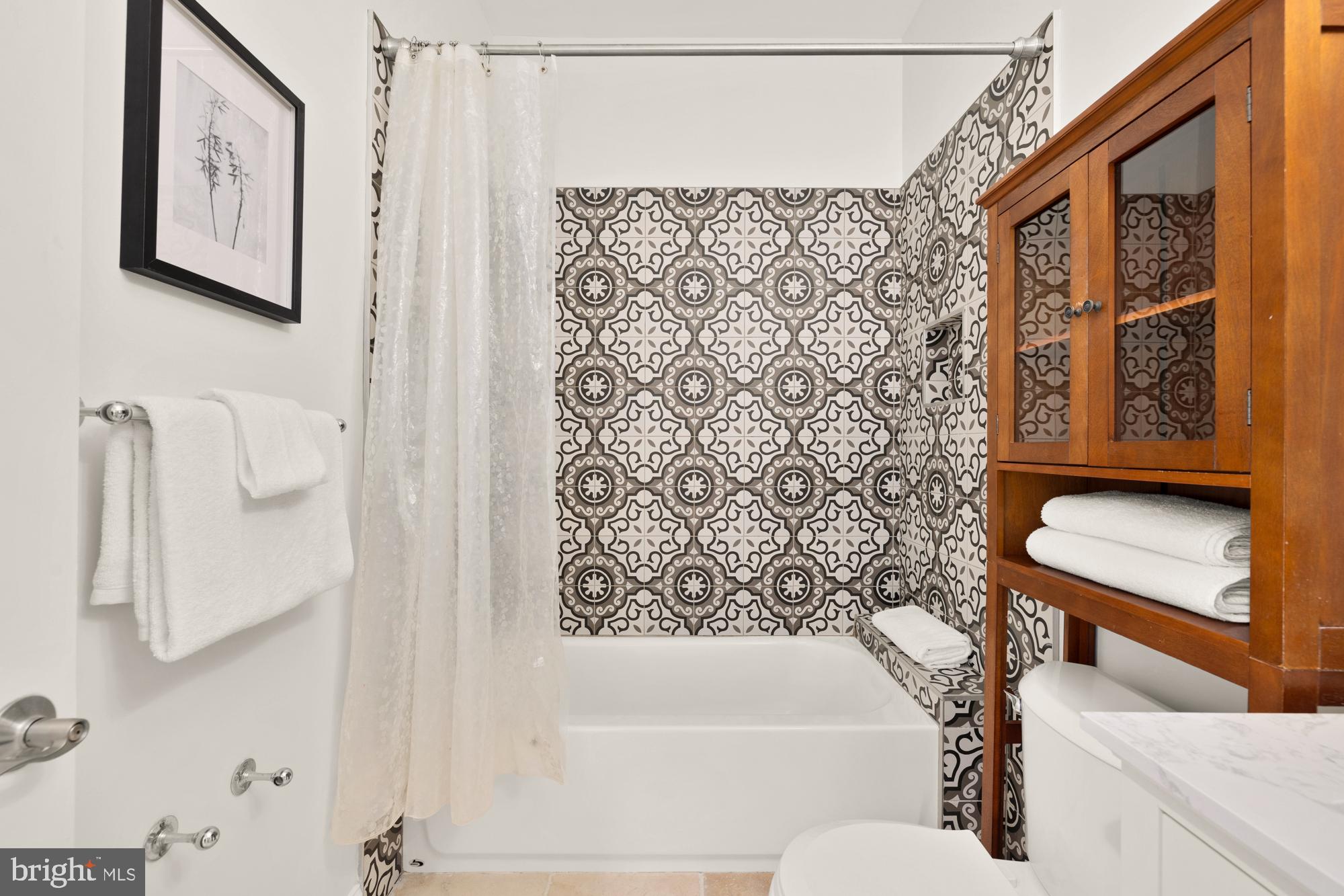 2713 Ontario Road Northwest, Unit 2 Washington, DC 20009 - Photo 23 of 33 a bathroom with a bathtub and shower