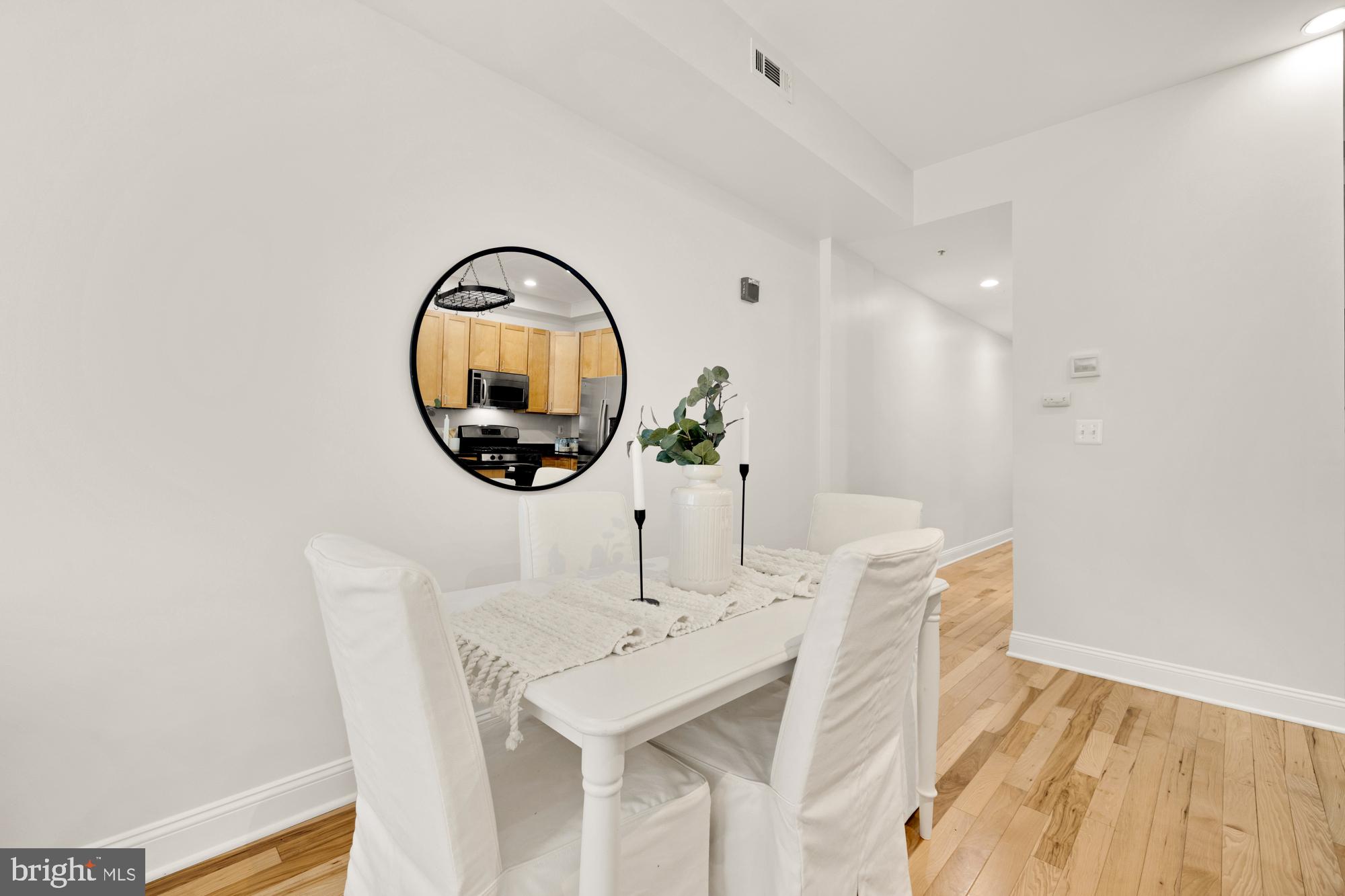 2713 Ontario Road Northwest, Unit 2 Washington, DC 20009 - Photo 7 of 33 a view of a dining room with furniture and wooden floor