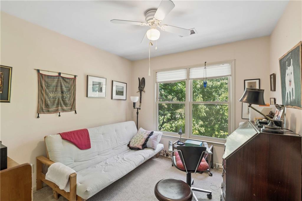 795 North Parkwood Road Decatur, GA 30030 - Photo 20 of 50 a living room with furniture and a large window