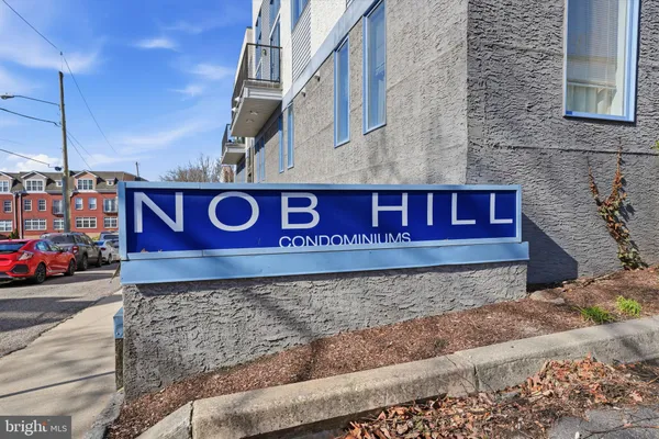 a sign that is on the side of a building