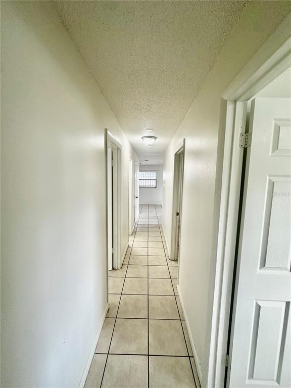 4936 Lanette Street Orlando, FL 32811 - Photo 15 of 17 a view of a hallway