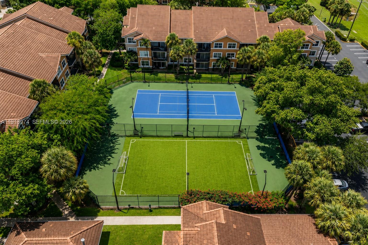 8801 Wiles Road, Unit 307 Coral Springs, FL 33067 - Photo 16 of 18 an aerial view of a house