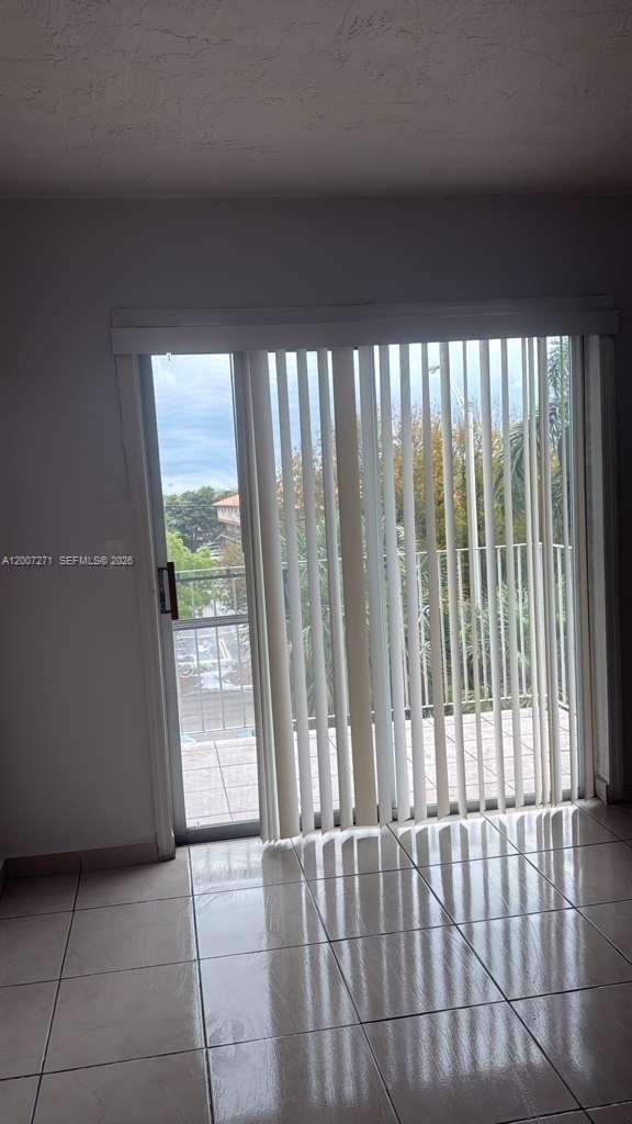 1655 West 44th Place, Unit 451 Hialeah, FL 33012 - Photo 12 of 12 a view of a black and white floor to ceiling window