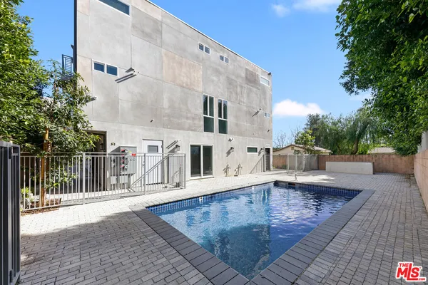 swimming pool view with a outdoor space