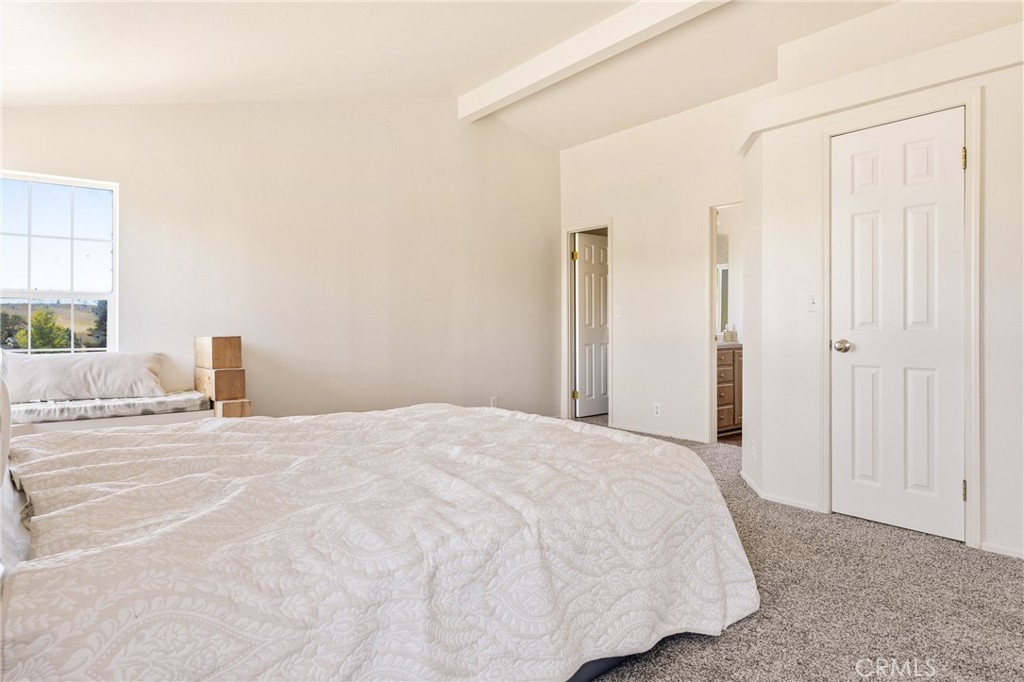 6998 Kingsbury Road Templeton, CA 93465 - Photo 46 of 59 Primary bedroom with two walk in closets and en suite bathroom