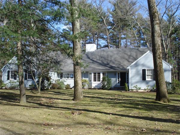 115 Winding River Road Needham, MA 02492 - Photo 1 of 15 a front view of a house with a yard
