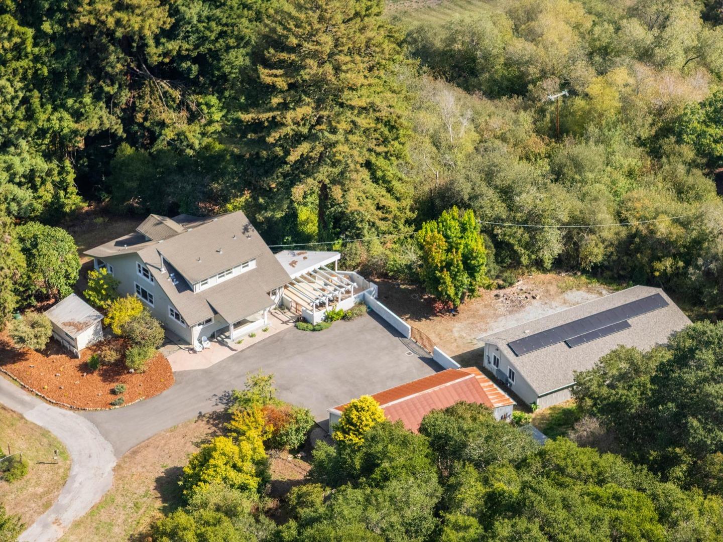 653 Larkin Valley Road Watsonville, CA 95076 - Photo 110 of 116 an aerial view of a house with yard and street view