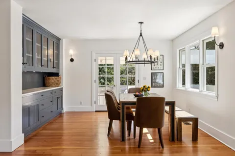 a bedroom with a bed and couch