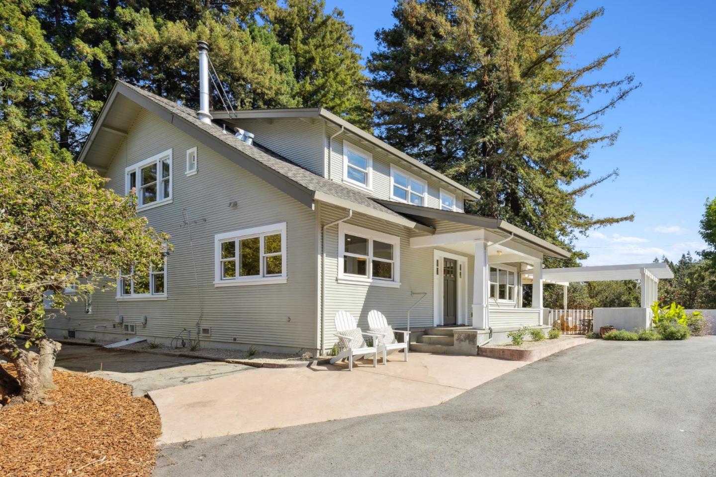 653 Larkin Valley Road Watsonville, CA 95076 - Photo 2 of 116 a backyard of a house with yard fire pit and outdoor seating