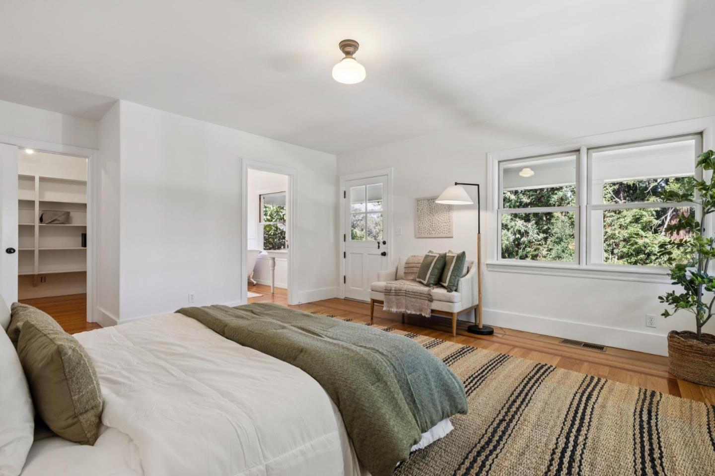 653 Larkin Valley Road Watsonville, CA 95076 - Photo 22 of 116 a bedroom with a large bed and a window
