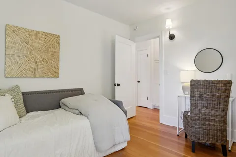 a view of a house with a yard and garage