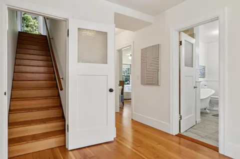 an aerial view of a house with a yard and garden