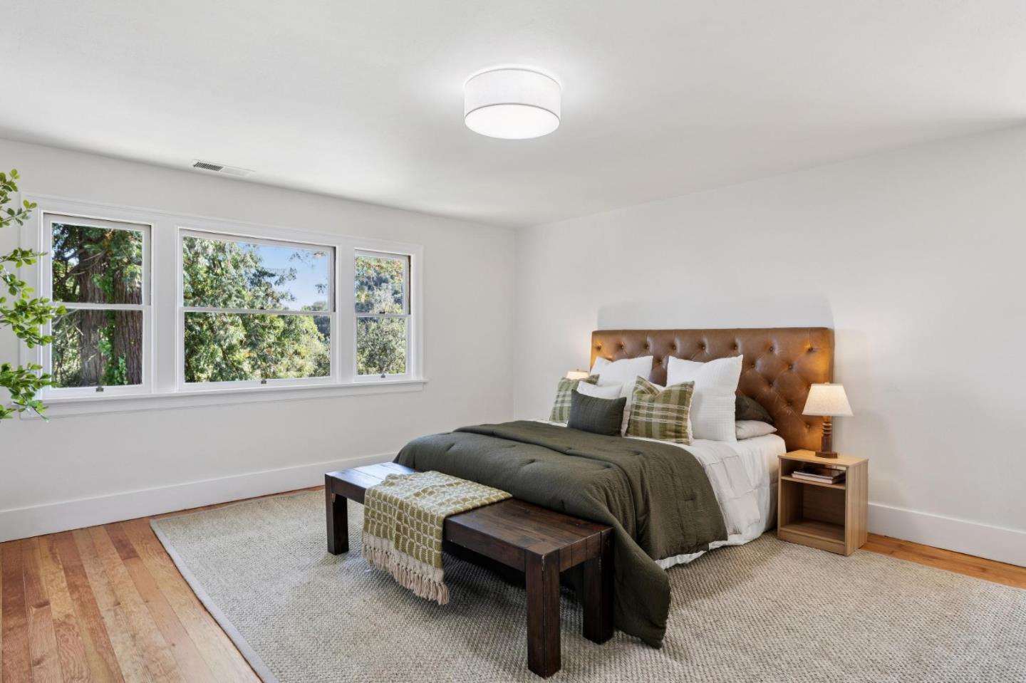 653 Larkin Valley Road Watsonville, CA 95076 - Photo 51 of 116 a bedroom with a bed and a window