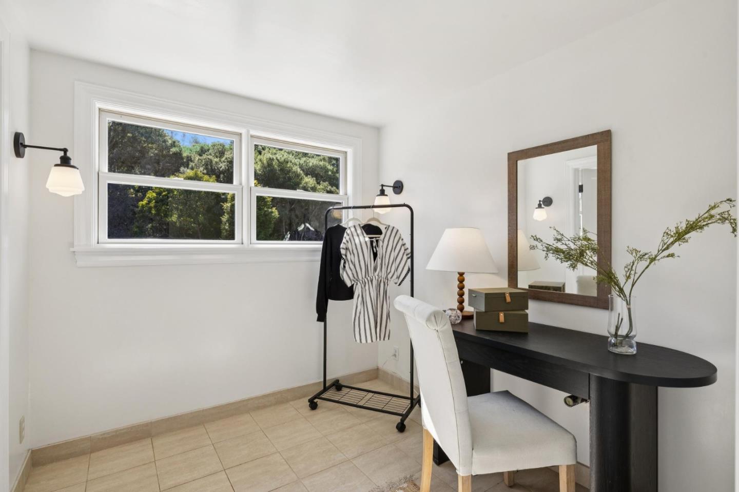 653 Larkin Valley Road Watsonville, CA 95076 - Photo 56 of 116 a view of a workspace with furniture and a window