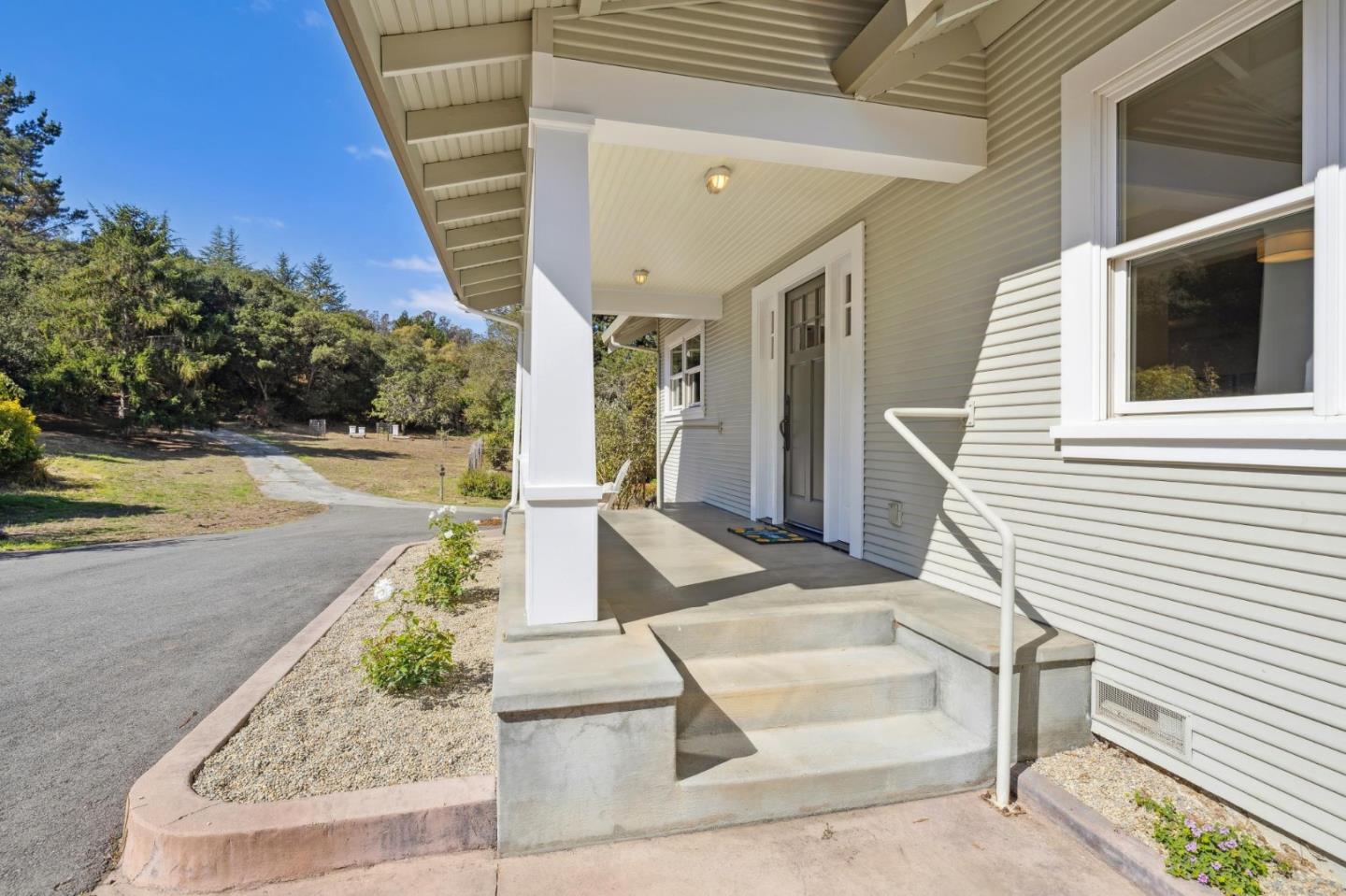 653 Larkin Valley Road Watsonville, CA 95076 - Photo 79 of 116 a view of a patio with table and chairs with wooden floor and fence