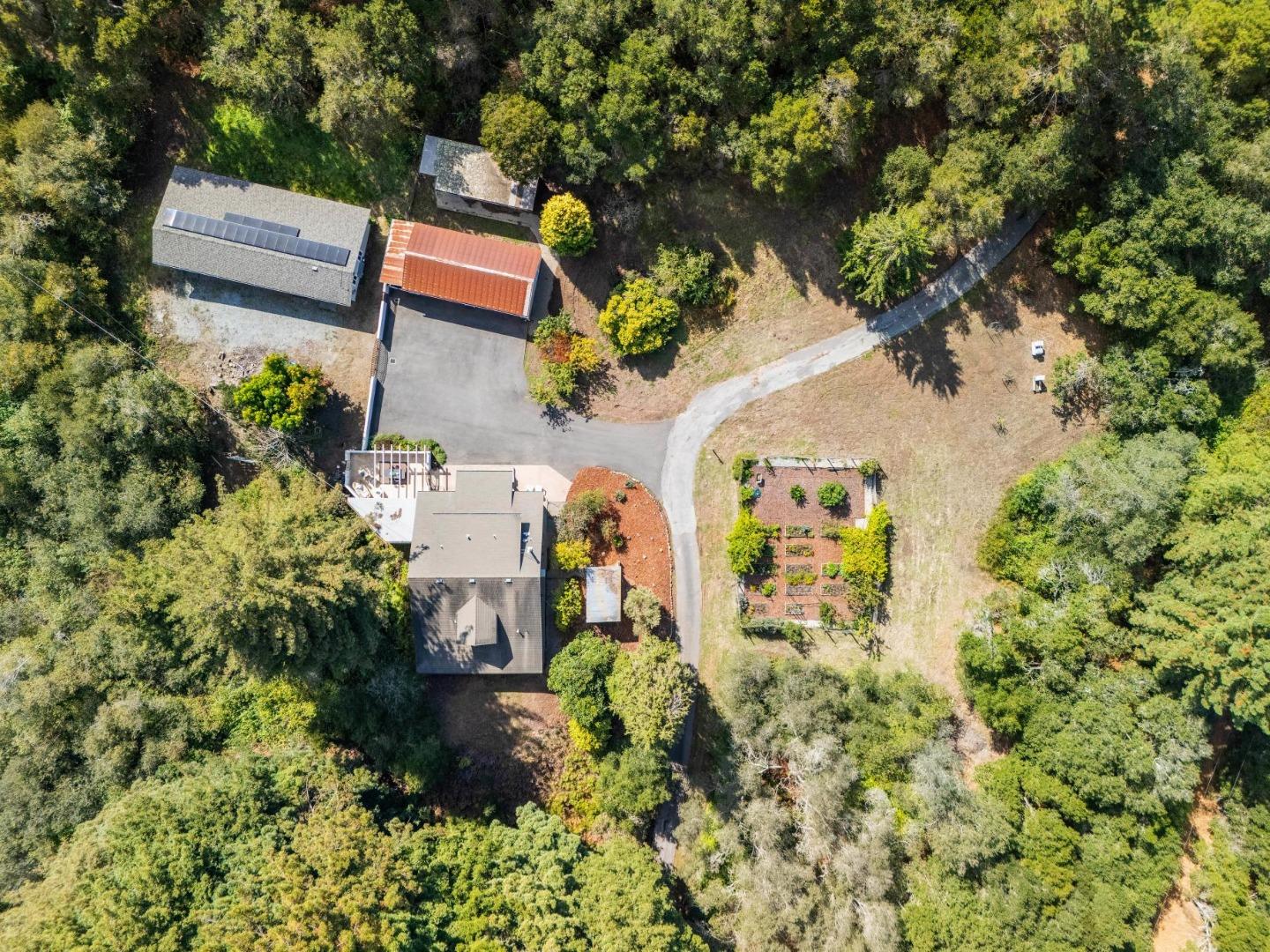 653 Larkin Valley Road Watsonville, CA 95076 - Photo 88 of 116 an aerial view of a house with a yard and garden