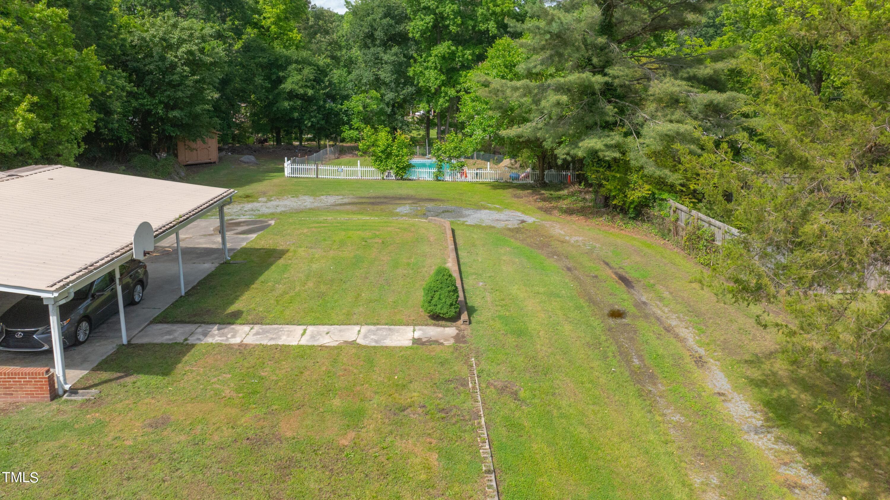 244 Semora Road Roxboro, NC 27573 - Photo 33 of 42 a view of an outdoor space and swimming pool