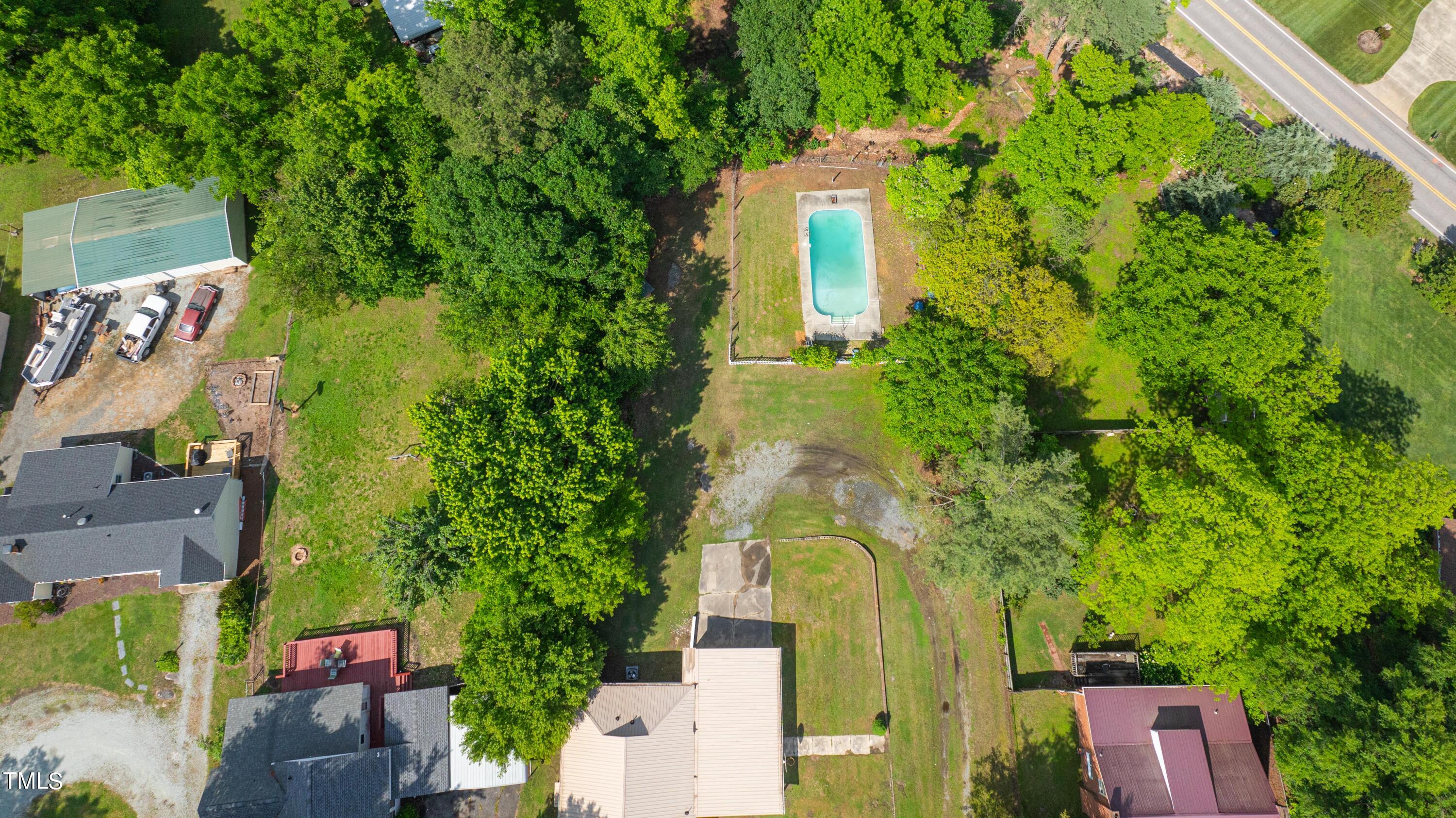 244 Semora Road Roxboro, NC 27573 - Photo 41 of 42 an aerial view of a house with a yard