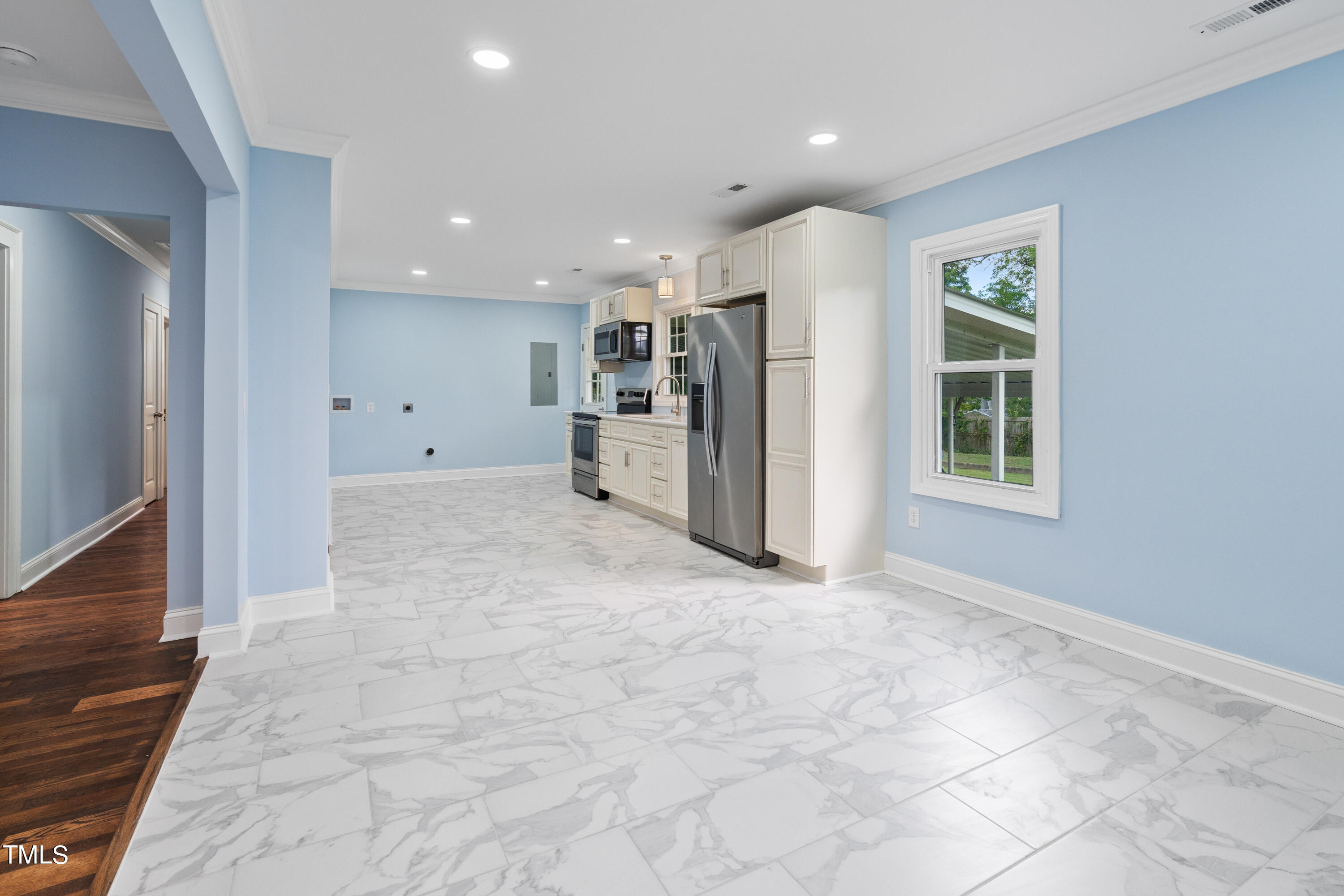 244 Semora Road Roxboro, NC 27573 - Photo 7 of 42 a view of kitchen with furniture and refrigerator