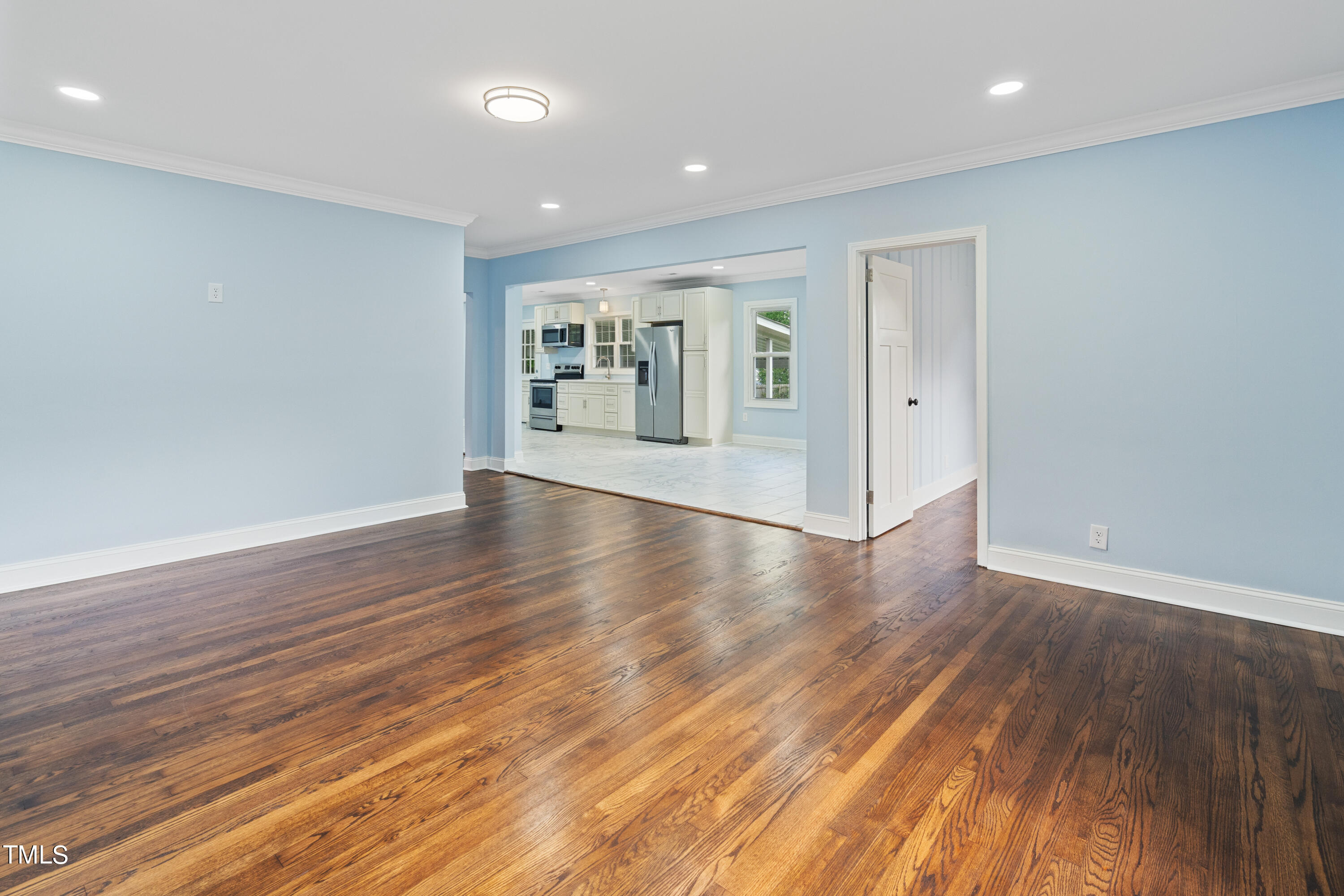 244 Semora Road Roxboro, NC 27573 - Photo 9 of 42 a view of livingroom with hardwood floor and hallway