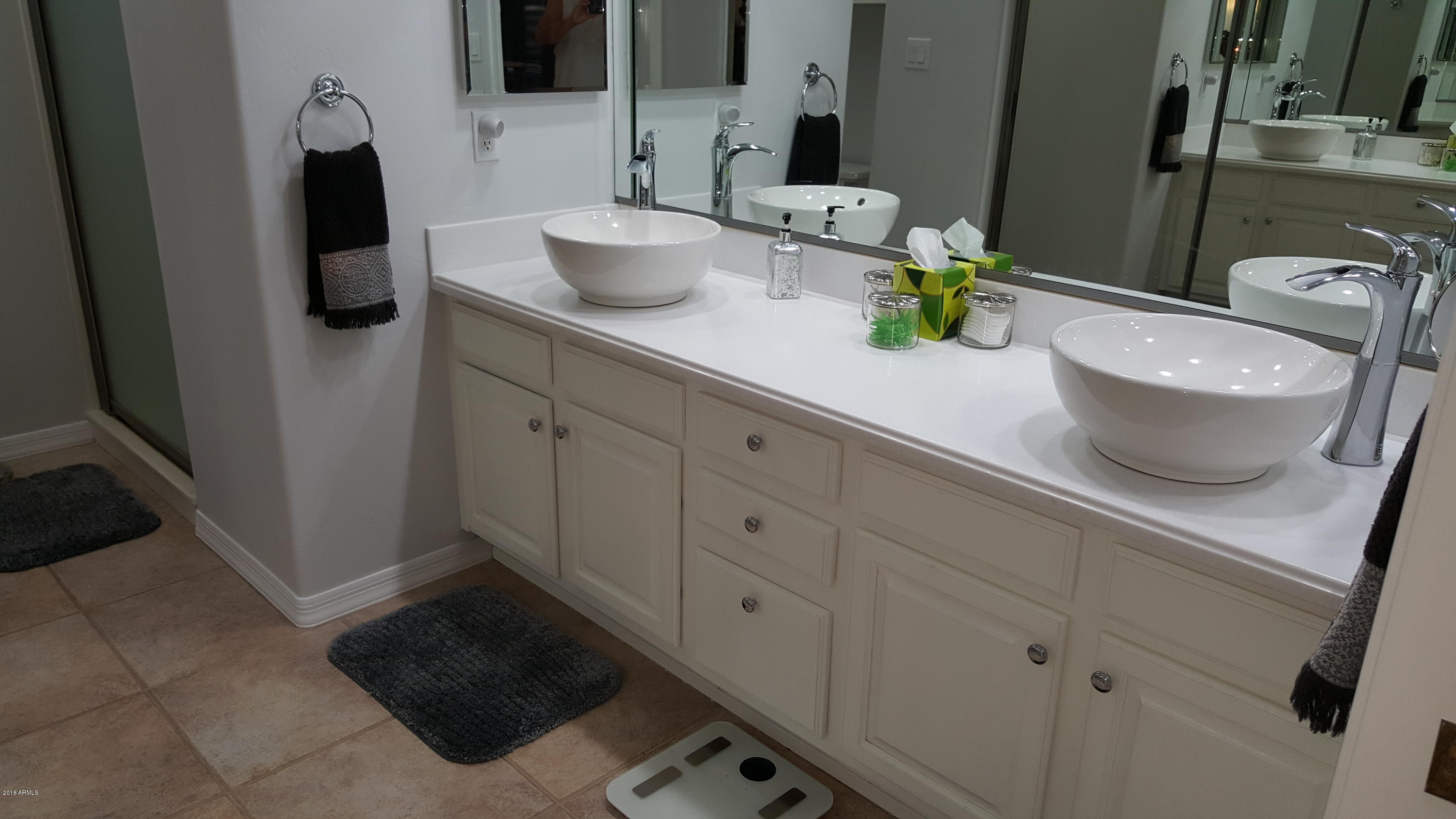 5830 East McKellips Road, Unit 75 Mesa, AZ 85215 - Photo 15 of 30 a bathroom with a sink and mirror