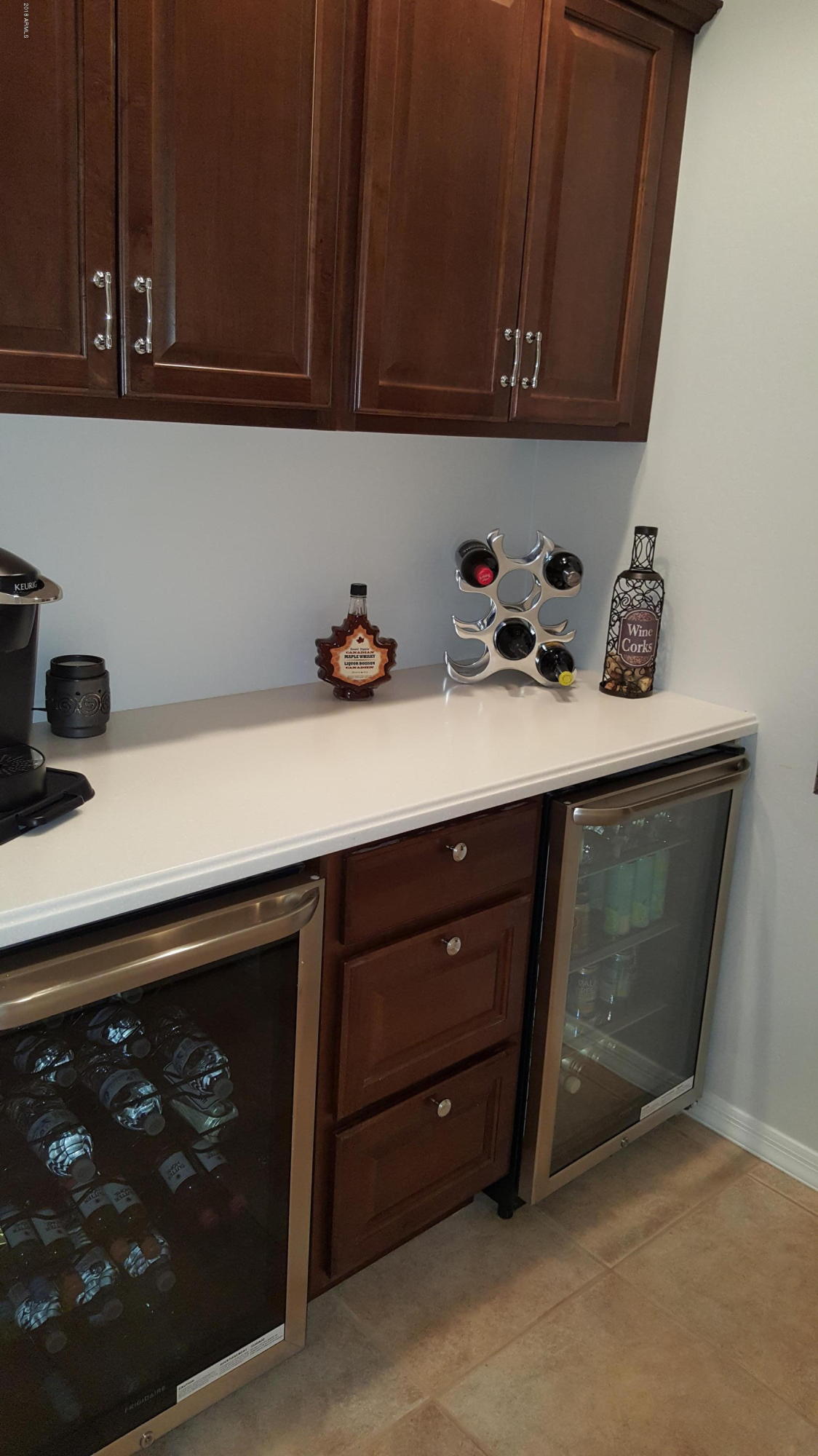 5830 East McKellips Road, Unit 75 Mesa, AZ 85215 - Photo 20 of 30 a kitchen with a sink and cabinets