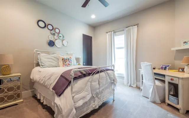 a bathroom with a granite countertop sink a shower and a mirror