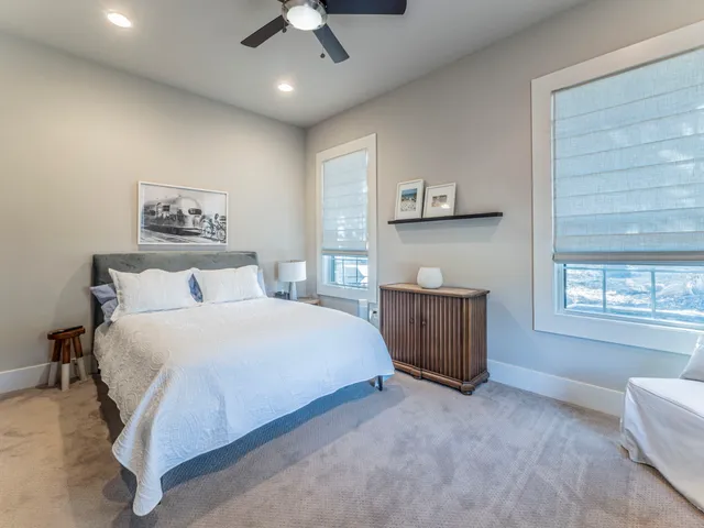 a view of a swimming pool with an outdoor seating