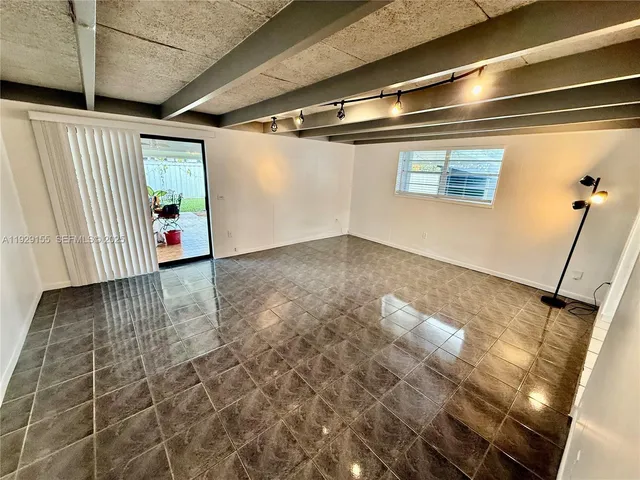 a view of a backyard of a house