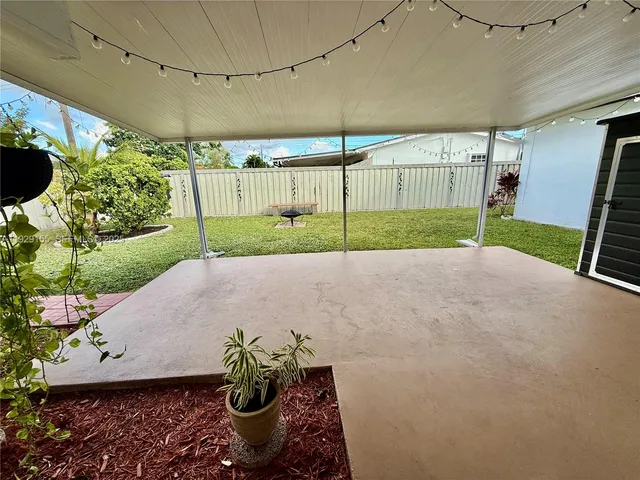 a house view with a garden space