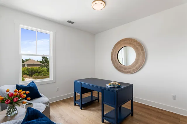 a room with furniture and a window