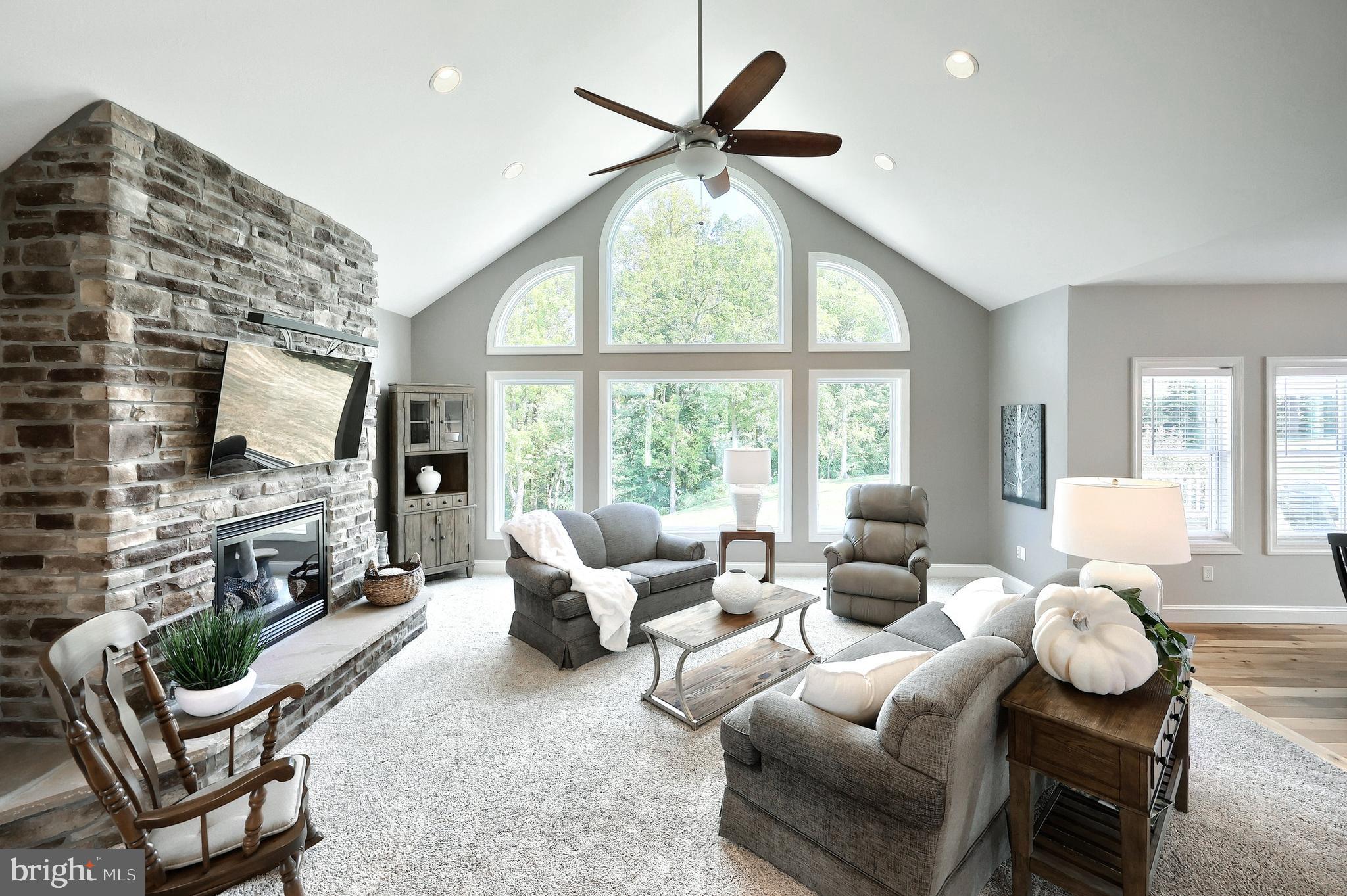 172 Fawn Hill Road Hanover, PA 17331 - Photo 37 of 71 a living room with furniture fireplace and a flat screen tv