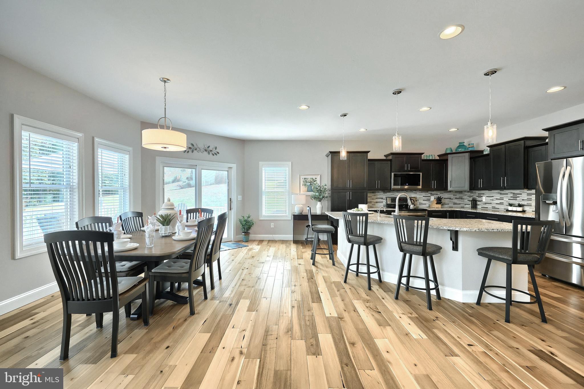 172 Fawn Hill Road Hanover, PA 17331 - Photo 41 of 71 a view of a dining room with furniture window and wooden floor