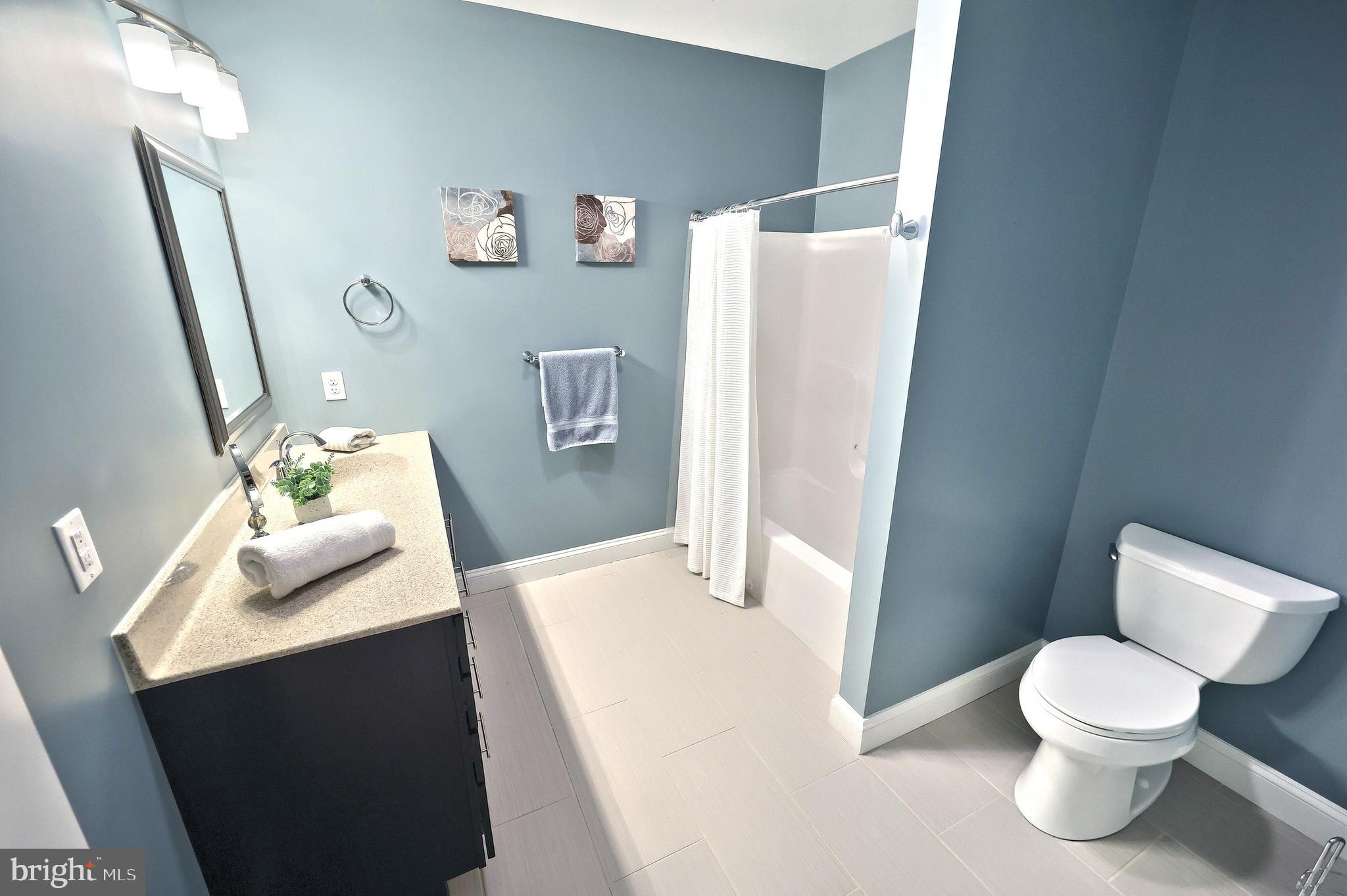 172 Fawn Hill Road Hanover, PA 17331 - Photo 66 of 71 a white toilet sitting next to a bathroom sink