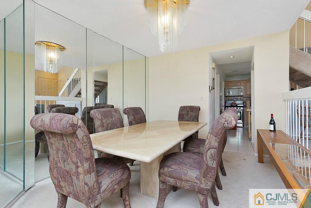 157 Westgate Drive Edison, NJ 08820 - Photo 3 of 12 a view of a dining room with furniture