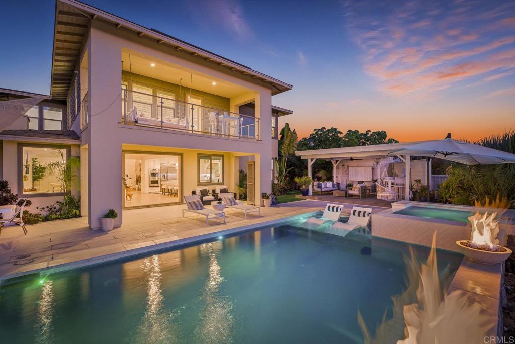870 Hymettus Avenue Encinitas, CA 92024 - Photo 1 of 74 a view of a house with pool lawn chairs and a yard