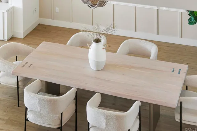 a close view of a sink a faucet a window and a mirror