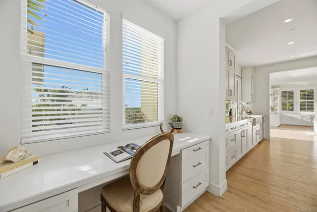 a spacious bathroom with a granite countertop tub and a sink