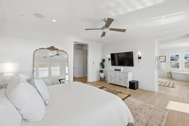 a view of a terrace with furniture and city view