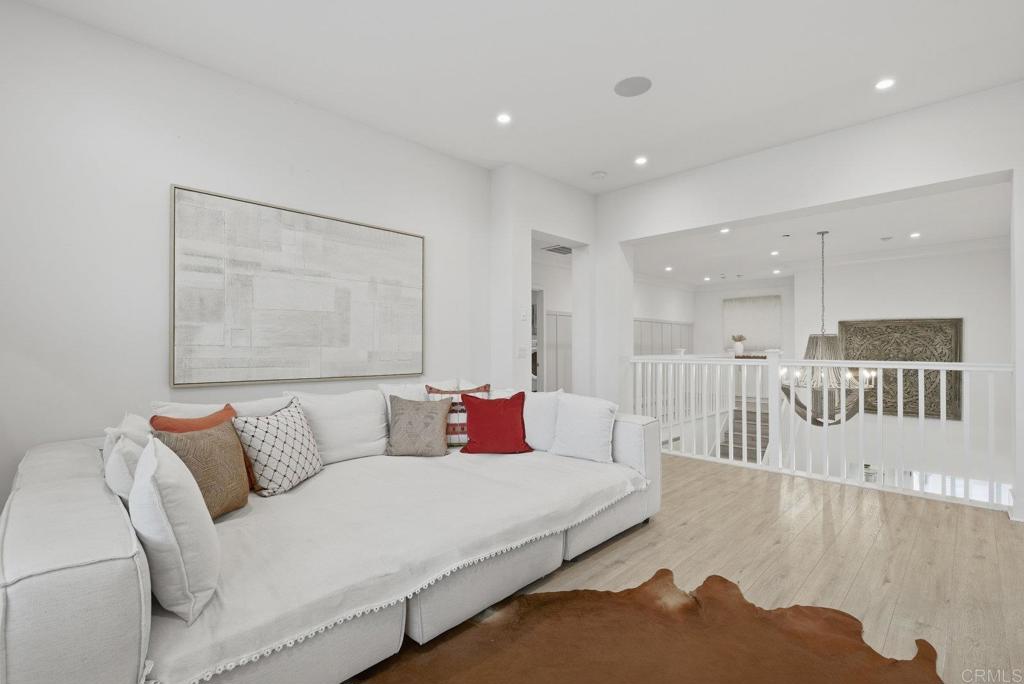 870 Hymettus Avenue Encinitas, CA 92024 - Photo 47 of 74 a bedroom with a bed and a couch