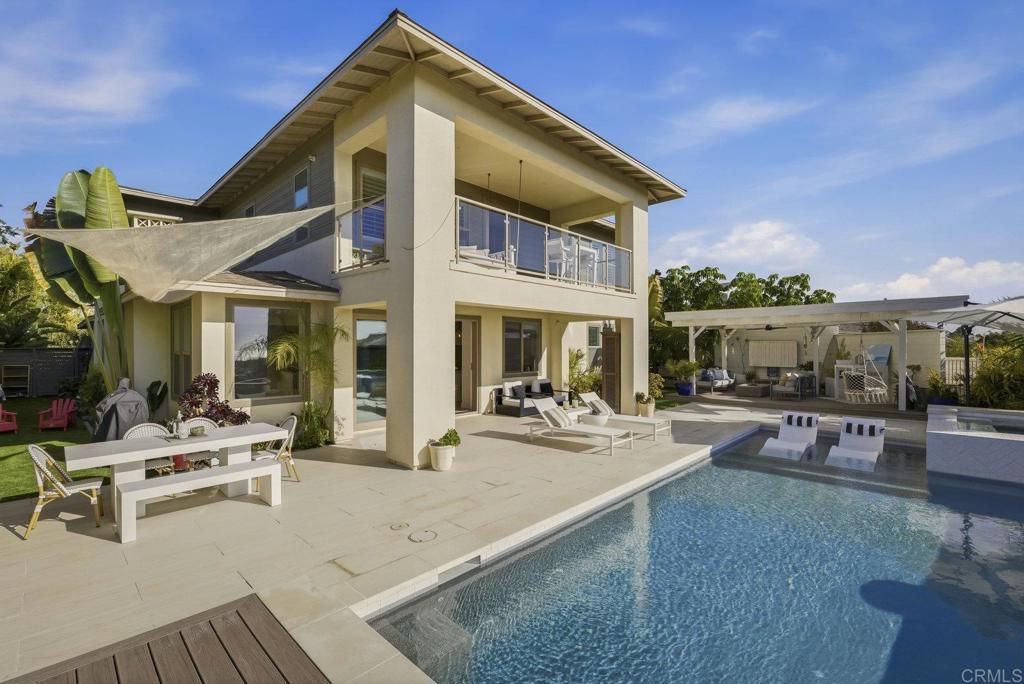 870 Hymettus Avenue Encinitas, CA 92024 - Photo 55 of 74 a view of a house with backyard porch and sitting area