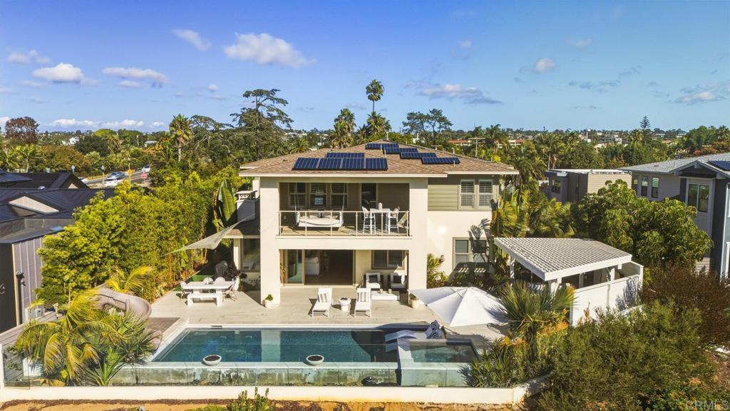 870 Hymettus Avenue Encinitas, CA 92024 - Photo 63 of 74 a front view of a house with a yard