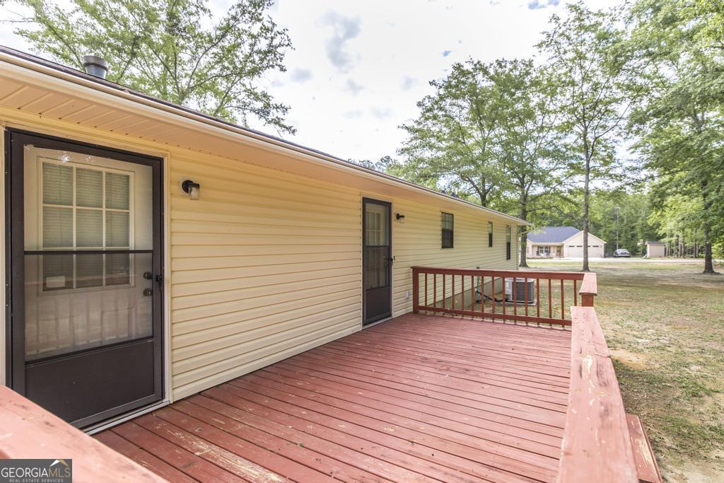 904 Robinhood Road Dublin, GA 31021 - Photo 25 of 29 a view of a house with a balcony