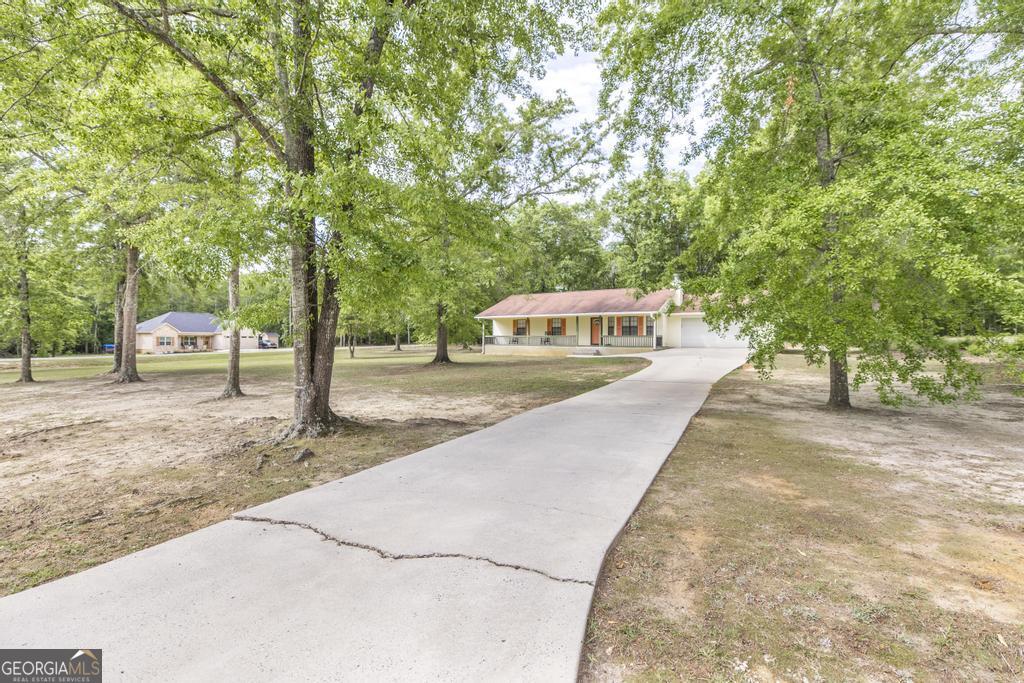 904 Robinhood Road Dublin, GA 31021 - Photo 4 of 29 a park view with large trees