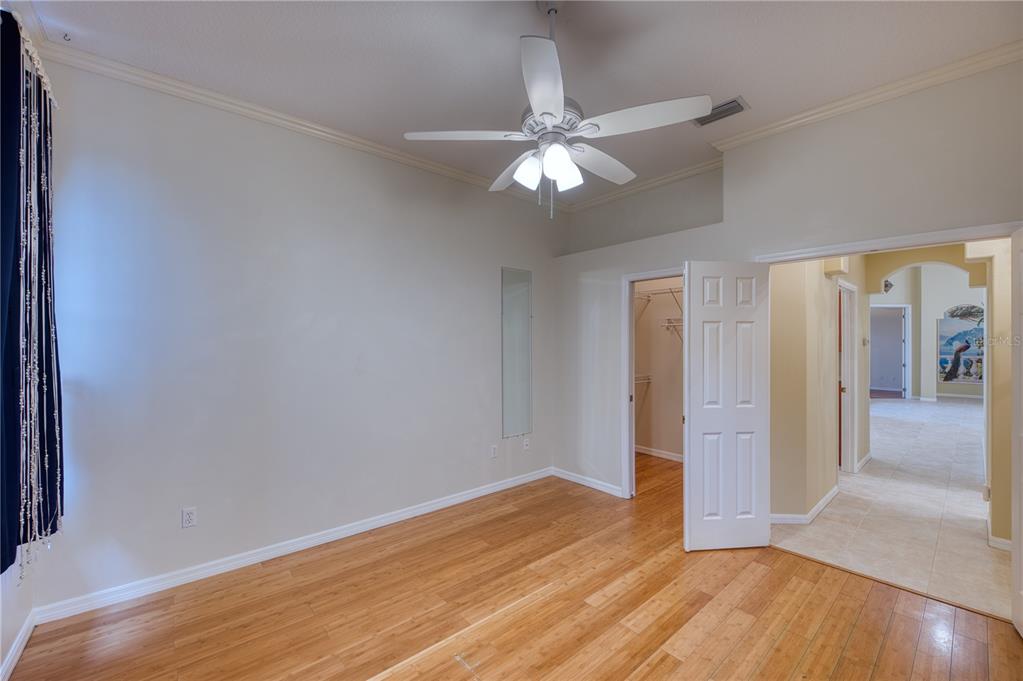 10523 Cheval Place Lakewood Ranch, FL 34202 - Photo 21 of 52 wooden floor in an empty room