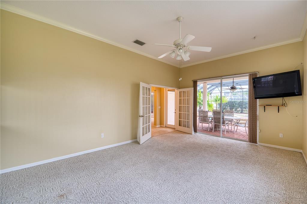 10523 Cheval Place Lakewood Ranch, FL 34202 - Photo 34 of 52 a view of an empty room with a window